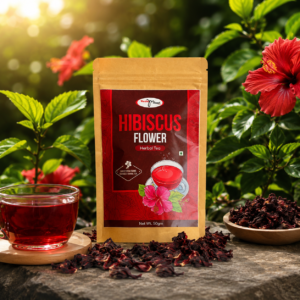 Kadambari Hibiscus Flower Herbal Tea 50gm pack displayed with brewed hibiscus tea and dried hibiscus petals in a natural garden setting.