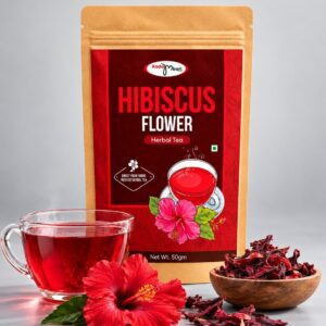 Kadambari Hibiscus Flower Tea pouch with a cup of red hibiscus tea and dried hibiscus