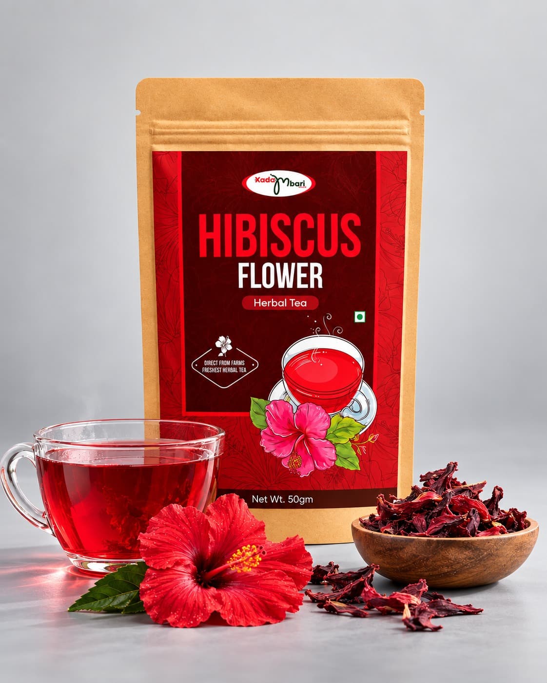 Kadambari Hibiscus Flower Tea pouch with a cup of red hibiscus tea and dried hibiscus
