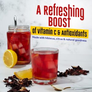 Iced hibiscus tea with lemon and dried hibiscus flowers