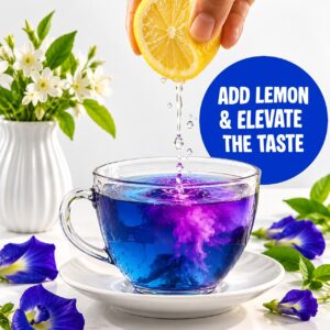 Lemon squeezed into blue butterfly pea tea, turning it purple