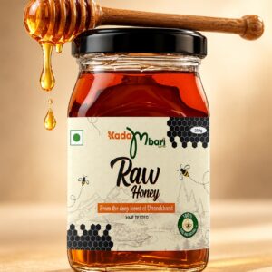 Kadambari Raw Honey jar with honey dripping from a wooden dipper
