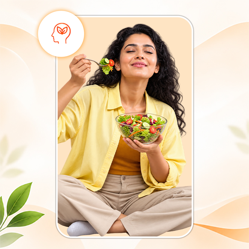 Woman eating a bowl of salad